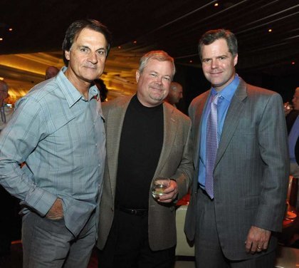 Tony LaRussa, Tim McGarry and Jim Murren pose at an event.
