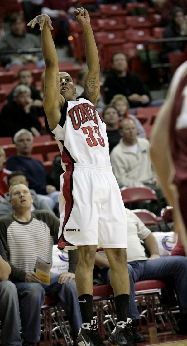 Tre'von Willis shoots a three Wednesday night as UNLV takes ...