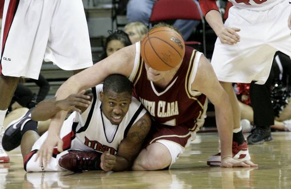 Wink Adams flips up a loose ball Wednesday night as ...