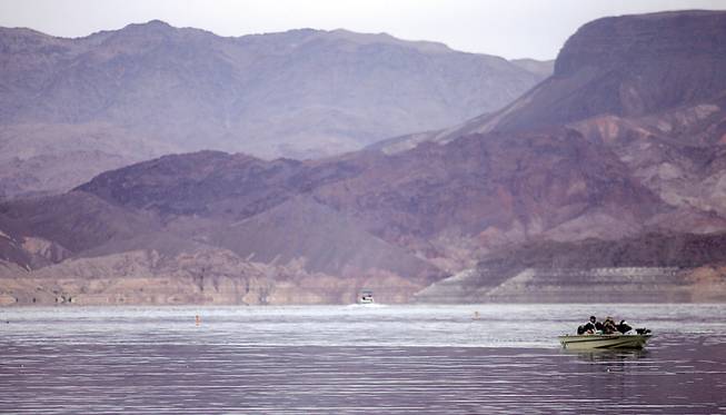 A boat enters Boulder Harbor at Lake Mead on Dec. 8. People have been only allowed to fish from shore, but the Nevada Board of Wildlife Commissioners recently voted to allow anglers in boats to fish in the harbor area starting in 2009.