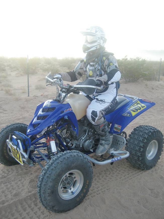 Greg Kovacevich aboard his quad racer.