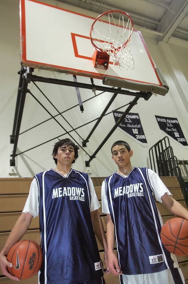 From left to right, brothers, Richard and Garrard Martinez, play on the Meadows' varsity basketball team.  