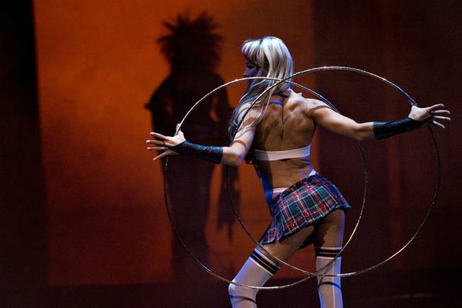 Julia Kolosova begins her aerial hula hoop number in Cirque ...