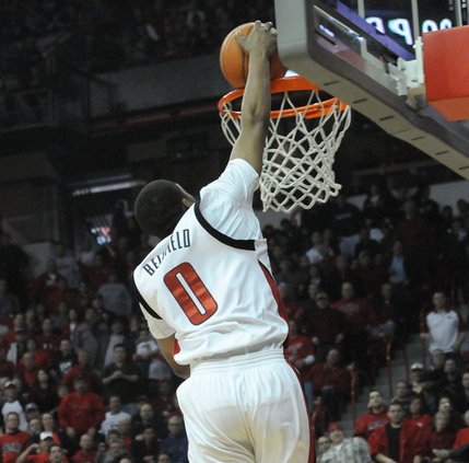 UNLV's Oscar Bellfield goes up for the dunk, and misses, during the first half Saturday against Arizona.  The Rebels defeated the Wildcats 79-64.