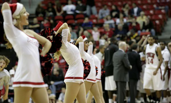 The Rebel Girls sport their holiday attire before Tuesday's game ...