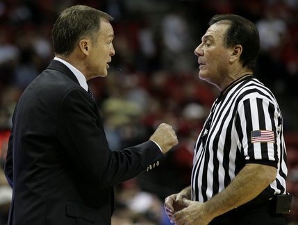 UNLV head coach Lon Kruger argues with the referee about a call Tuesday at the Thomas & Mack Center.  