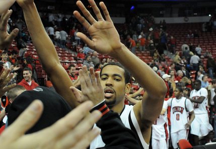 Rene Rougeau and the rest of the UNLV squad show the student section some appreciation Tuesday at the Thomas & Mack, where UNLV took on Southern Utah.