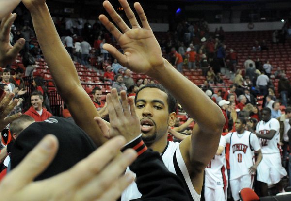Rene Rougeau and the rest of the UNLV squad show ...
