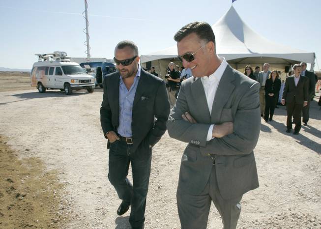 The Fertitta brothers, Lorenzo, left, and Frank attend the groundbreaking for Aliante Station last year. Now, as their company flounders with a recession deepening, they are running out of options as they try to stave off a bankruptcy filing.