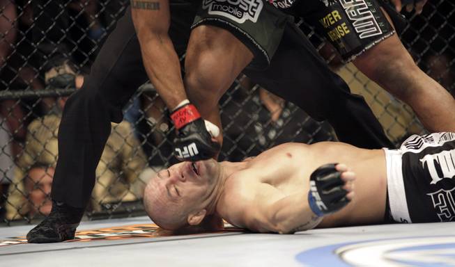Wanderlei Silva lays knocked out inside the Octagon Saturday night at the MGM Grand after Quinton "Rampage" Jackson delivered a perfectly-timed left hook. 