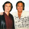 This photo of Neil Diamond, right, and impersonator Jay White was signed by the legendary crooner in December 2002. White is circulating a petition to have Diamond inducted into the Rock and Roll Hall of Fame. 