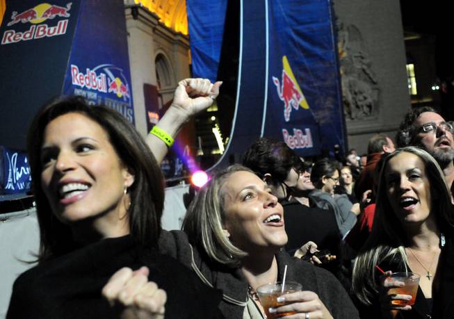 Fans cheer after Robbie Maddison jumps off the Arch De Triumph at the Paris Las Vegas on New Year's Eve.