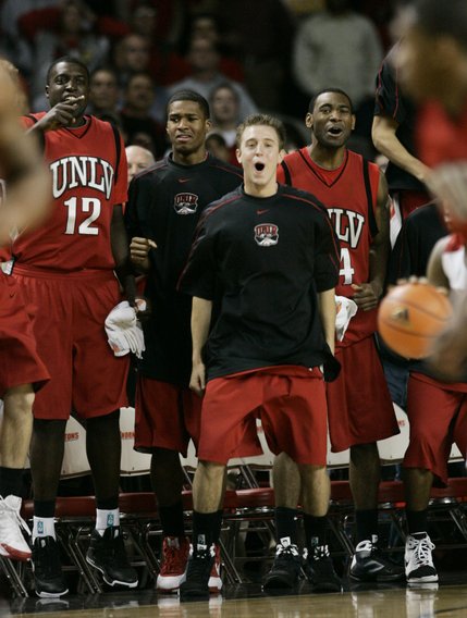 Players on the UNLV bench react after teammate Oscar Bellfield scores the winning basket late in the second half against Louisville in Louisville, Ky.