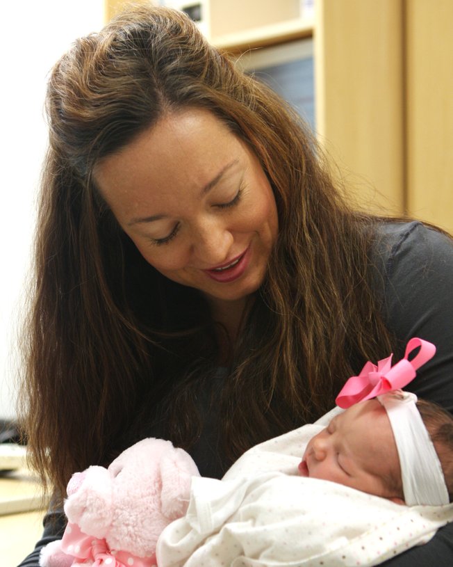 Jennifer Judd cuddles her newborn daughter, Khloe Noelle Judd, at St. Rose Dominican Hospital - Siena Campus. Khloe, Henderson's first baby of 2009, was born at 2:35 a.m. Thursday.