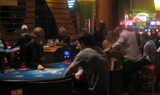 
<p>7:30 p.m.: The Palms casino floor was abuzz with bets and bettors on New Year's Eve.</p>

<p>The night got off to a slow start but still managed to finish strong.</p>

<p>The casino floor was surprisingly calm throughout the day and into the early evening. As the clock struck 5 p.m. it was hard to imagine the high-energy parties that were just hours away as gamblers sat quietly and methodically plunked quarters into slot machines.</p>

<p>Two hours later, however, the anticipation was building. Well-dressed crowds of people gathered to play cards and congregating at the craps tables. The casino floor was alive with dice, cards and chips of all colors.</p>