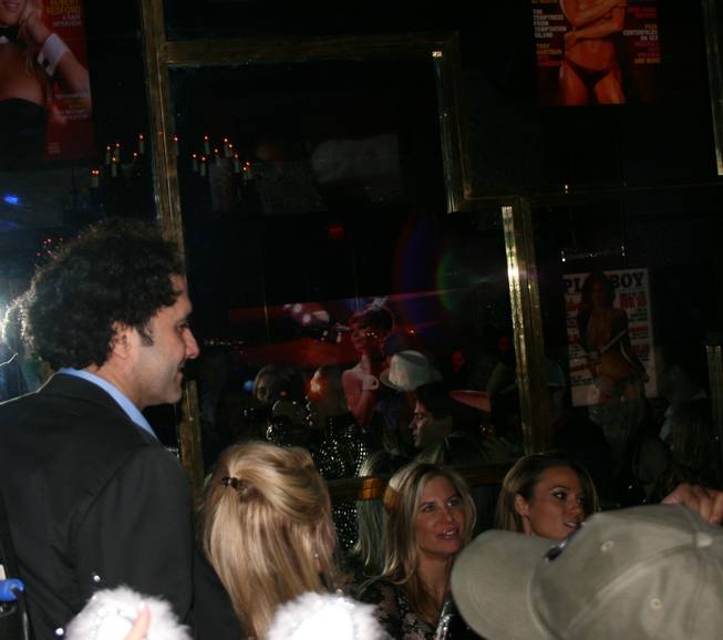 
<p>2:20 a.m.: Palms founder and president George Maloof smiles from his perch atop Kid Rock's private party table at Playboy nightclub on New Year's Eve.</p>

<p>Rock freestyled a few verses from the club's DJ booth before retiring to his table to take in the curvaceous scene.</p>

<p>While Maloof has welcomed the new year at his resort before, he noted one major difference this year compared to last.</p>

<p>"I don't have a girlfriend this year, which is good," he joked.</p>