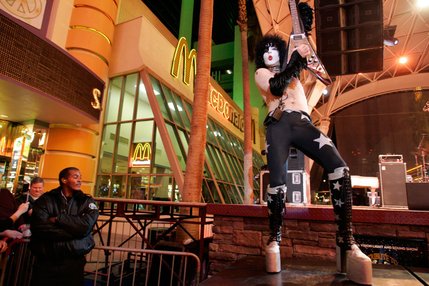 Gary Stevens portrays Paul Stanley in the band The Original Kiss Army during Tribute Palooza, the New Year's Eve party at the Fremont Street Experience in downtown Las Vegas Wednesday. 