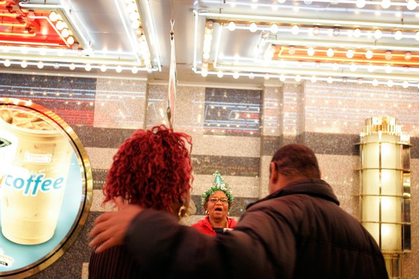 Mary Arnold of Las Vegas takes a photo of a ...