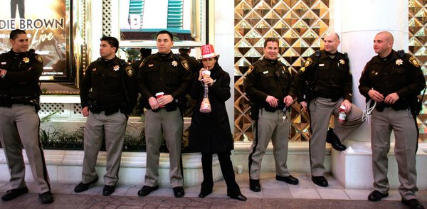 Antoinette Wentworth of Namibia, Africa stands with Metro Police officers ...