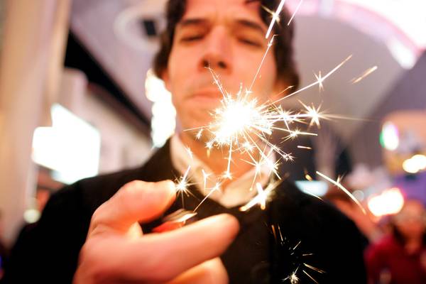 Adonis Cardero-Rosas lights up a sparkler during Tribute Palooza, the ...