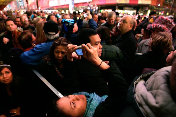 Mabelle Tubal of Las Vegas leans to take a photo ...