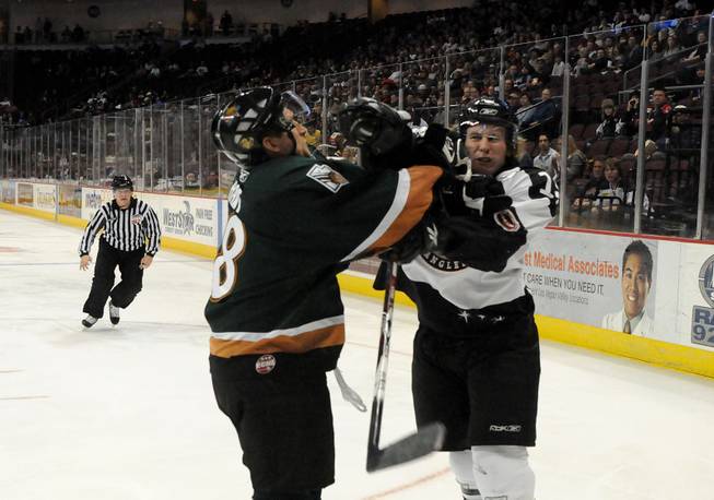 The Wranglers' Kelly Czuy mixed it up with Jordan Hart of the Utah Grizzlies on Jan. 2.