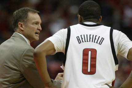 UNLV head coach Lon Kruger speaks with guard Oscar Bellfield during a break in the first half of their game against New Mexico at the Thomas & Mack Center.
