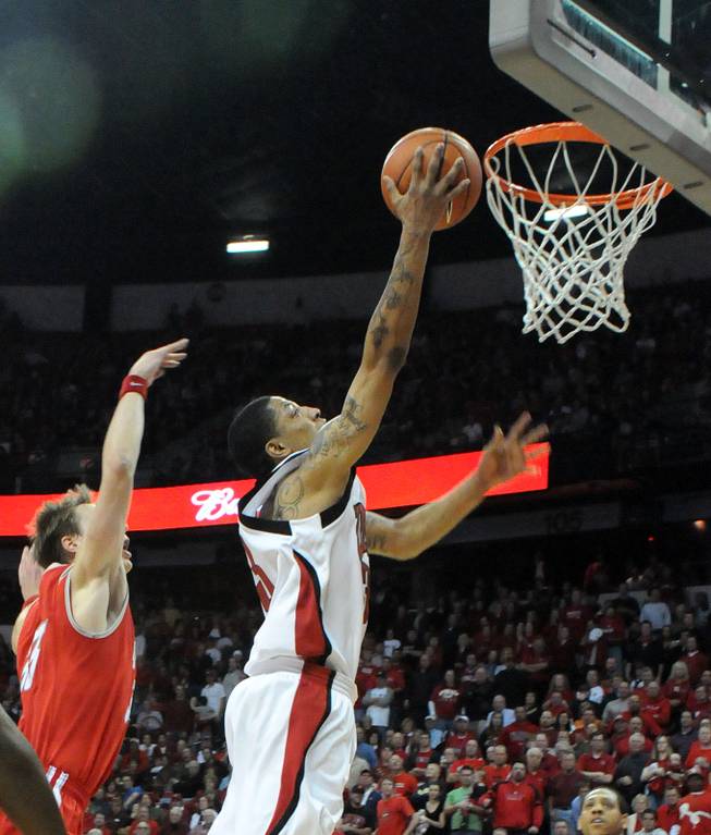 Tre'von Willis puts in a late layup Saturday at the Thomas and Mack Center as UNLV took on New Mexico.  The Rebels beat the Lobos, 60-58.