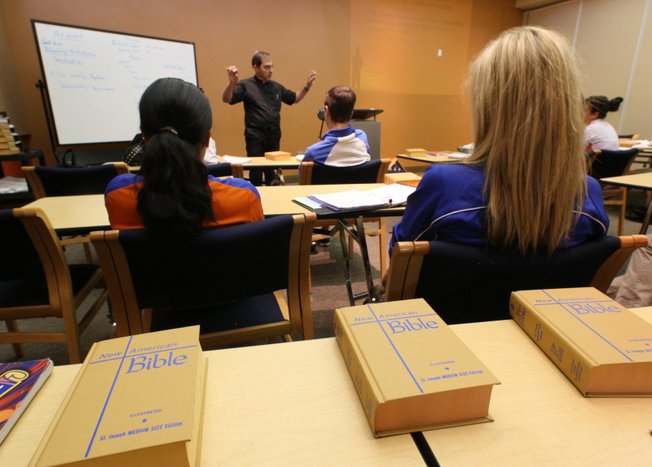 The Rev. John Kovalcin leads a class in Catholic Christianity, a sophomore course at Bishop Gorman High School. Nationally, 95 percent of Catholic school educators are lay teachers.