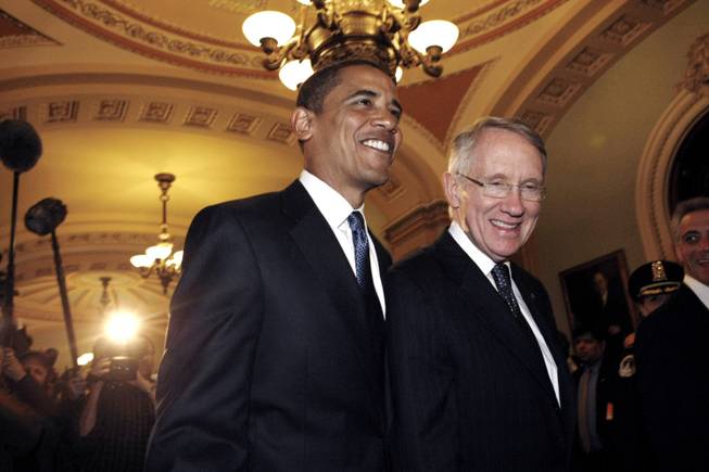 President-elect Barack Obama walks with Senate Majority Leader Harry Reid  on Capitol Hill on  Jan. 5, 2008, to a meeting with Congressional Republican and Democratic leaders.