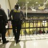 School Police officers monitor a girls basketball game Tuesday at Chaparral High. Athletic events ar