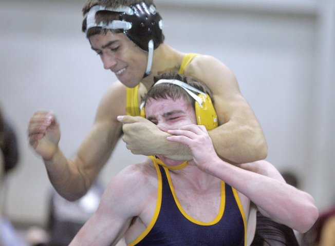 Sunny Hill's Bryan Saltysik, top, puts Boulder City's Daniel O'Conner in a headlock during the Wolves Duals wrestling tournament at Basic High School on Dec. 30.  
