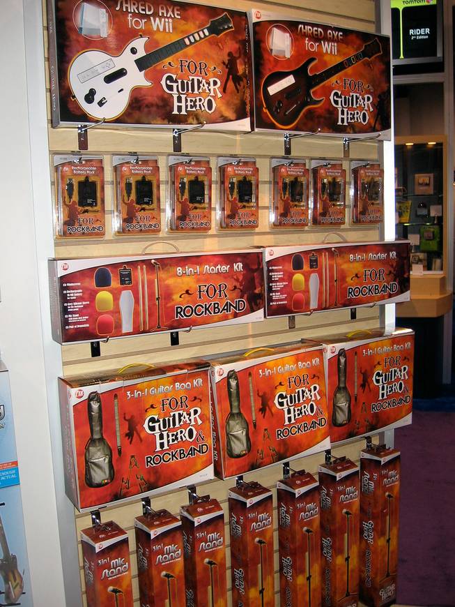 CTA Digital's all-wall display of their Rock Band and Guitar Hero peripherals for the Wii
