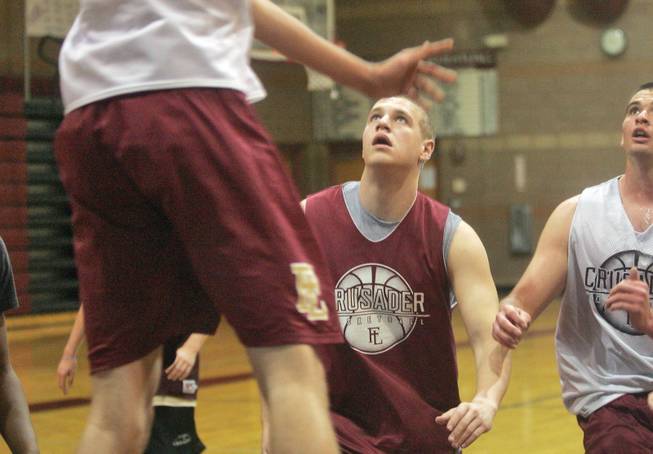 Faith Lutheran sophomore Brett Lubbe eyes a rebound during a recent practice.