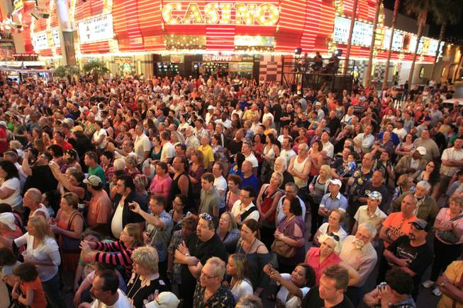 Elvis fans crowd Fremont Street during the second annual Las Vegas Ultimate Elvis Tribute Artist Contest Saturday, May 7, 2011 at the Fremont Street Experience.