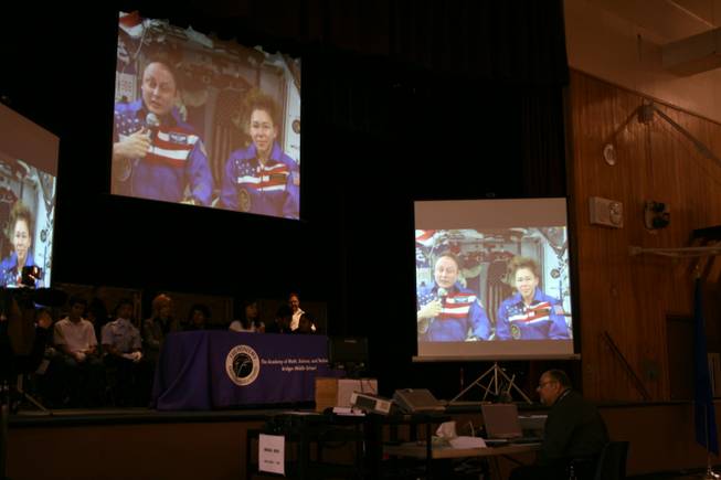 Astronauts Mike Fincke and Sandra Magnus answer questions via satellite for Jim Bridger Middle School students Thursday.