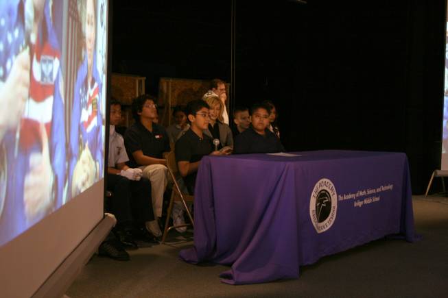 NASA Explorer School students listen to astronauts Mike Fincke and Sandra Magnus as they answer questions via satellite from the International Space Station Thursday.