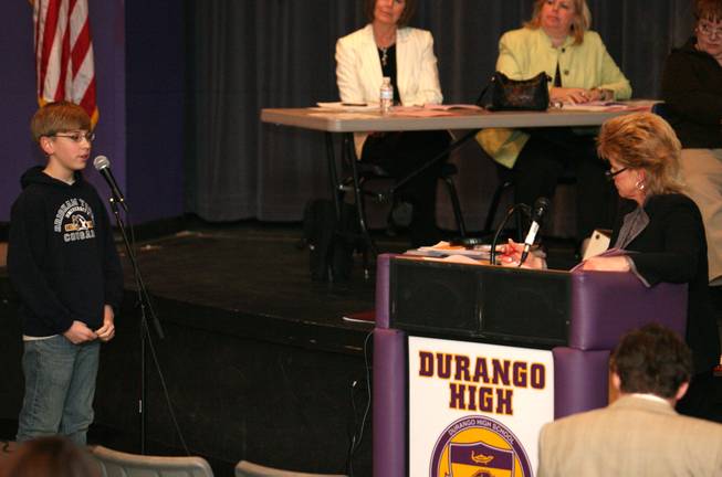 Sharon Dattoli, right, director of demographics and zoning for the Clark County School District, listens as Sig Rogich sixth-grader Kimball Knuth, 12, talks about why he doesn't want to be relocated to another school during a public input meeting Tuesday at Durango High School.
