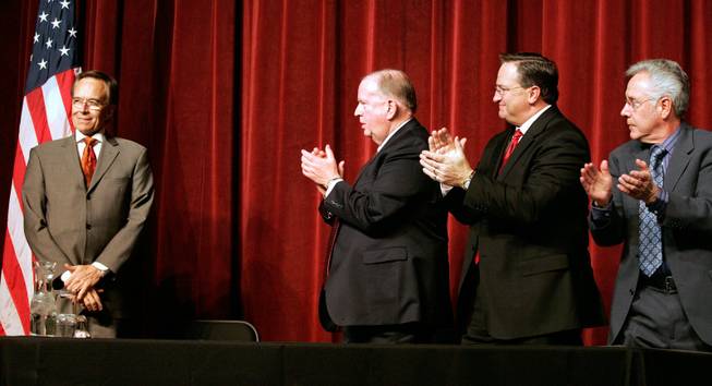 City Manager Douglas Selby, far left, is honored at his last State of the City address with a standing ovation by interim City Councilman David Steinman and City Councilmen Steven Ross and Gary Reese during the 2009 State of the City address at the Fifth Street School in downtown Las Vegas Tuesday.