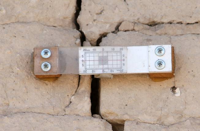 A measuring device helps track the widening of cracks in the walls of the adobe. Preservationists would like to see the ranch site saved, but the economy is likely to be a hindrance.