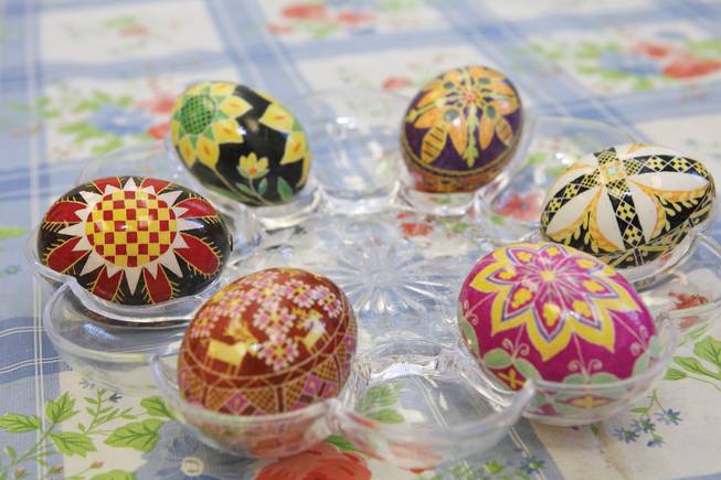 Colorful Ukrainian Easter eggs designed and hand dyed by Ukrainian instructor Joy Brittan are on display during a Pysanky craft class held at the Henderson Senior Center.