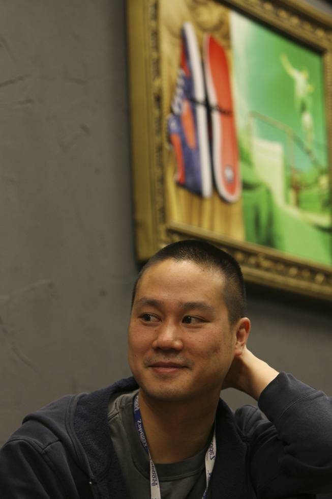Zappos.com CEO Tony Hsieh listens during a meeting at the company's corporate offices in Henderson. Hsieh became a millionaire in 1998 at 24 when he sold his online advertising company to Microsoft. He founded Zappos.com in 1999.