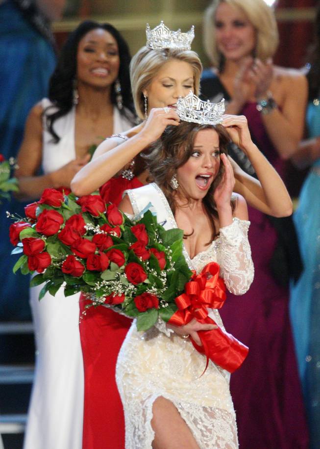Miss Indiana Katie Stam is crowned Miss America 2009 by Miss America 2008 Kirsten Haglund in Las Vegas on Saturday, Jan. 24, 2009. 