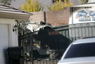 A woman's body was found inside a trailer that caught fire early Tuesday morning in northwestern Las Vegas.   