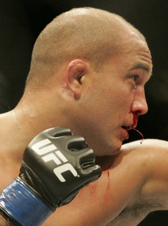Blood pours from the nose of B.J. Penn in the third round of his welterweight title bout against champion Georges St. Pierre at UFC 94  at the MGM Grand Garden Arena. 