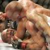 Georges St. Pierre pounds on B.J. Penn in the fourth round of their welterweight title bout at UFC 94 Saturday at the MGM Grand Garden Arena. 