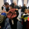 Senate Majority Leader Steven Horsford and his daughter, Ella, greet Sen. Barbara Cegavske before a Leader's Prayer Breakfast in the old assembly chambers in Carson City on Monday. 