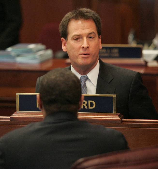 Lt. Governor and President of the Senate Brian Krolicki talks to Senate Majority Leader Steven Horsford on the first day of the 2009 legislative session in Carson City.  