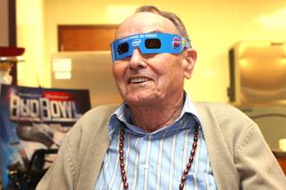 Veteran Gerry Simmons enjoys the commercials, especially the ones in 3D, using 3D glasses during the Super Bowl party at the Nevada State Veterans Home on Sunday.