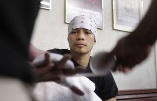 WBA interim super flyweight champion Nonito Donaire, Jr. of the Philippines has his hands wrapped before a workout at Top Rank Gym Wednesday, February 3, 2010. Donaire will defend the title against Gerson Guerrero of Mexico City at the Las Vegas Hilton on February 13.